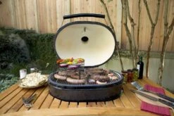Primo Oval XL 400 Ceramic Kamado Grill On Table 13 Primo Oval XL 400 Ceramic Kamado Grill On Table -Elite Patio Direct Shop oval xl 400 action